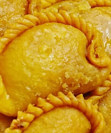 Chandrakala sweet traditional Indian dessert with crisp outer layer and rich filling